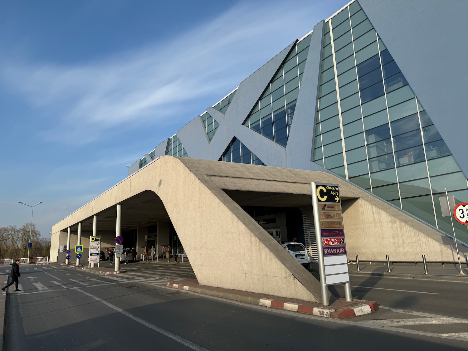 a building with a triangular shaped entrance