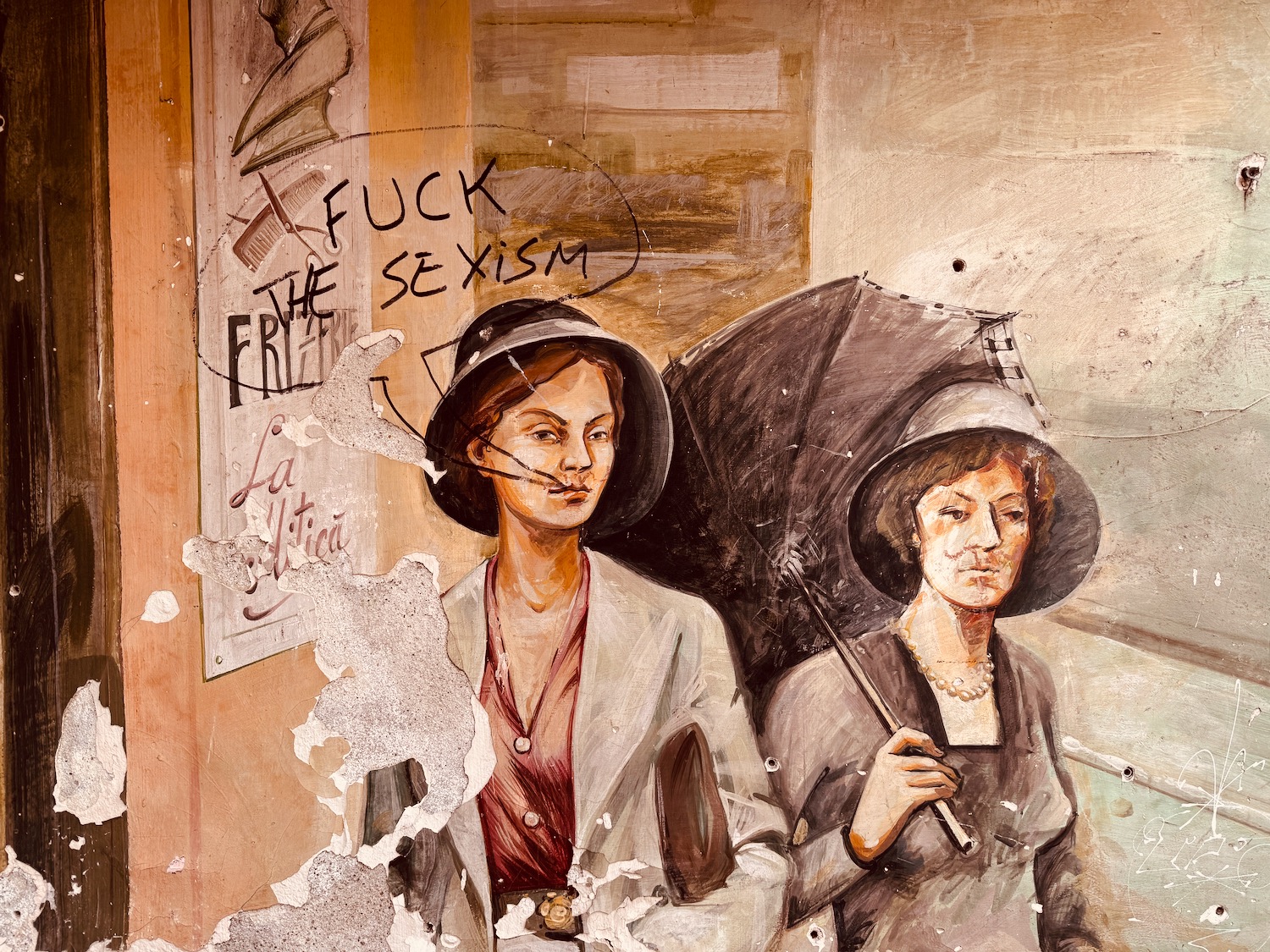 a painting of women with umbrellas