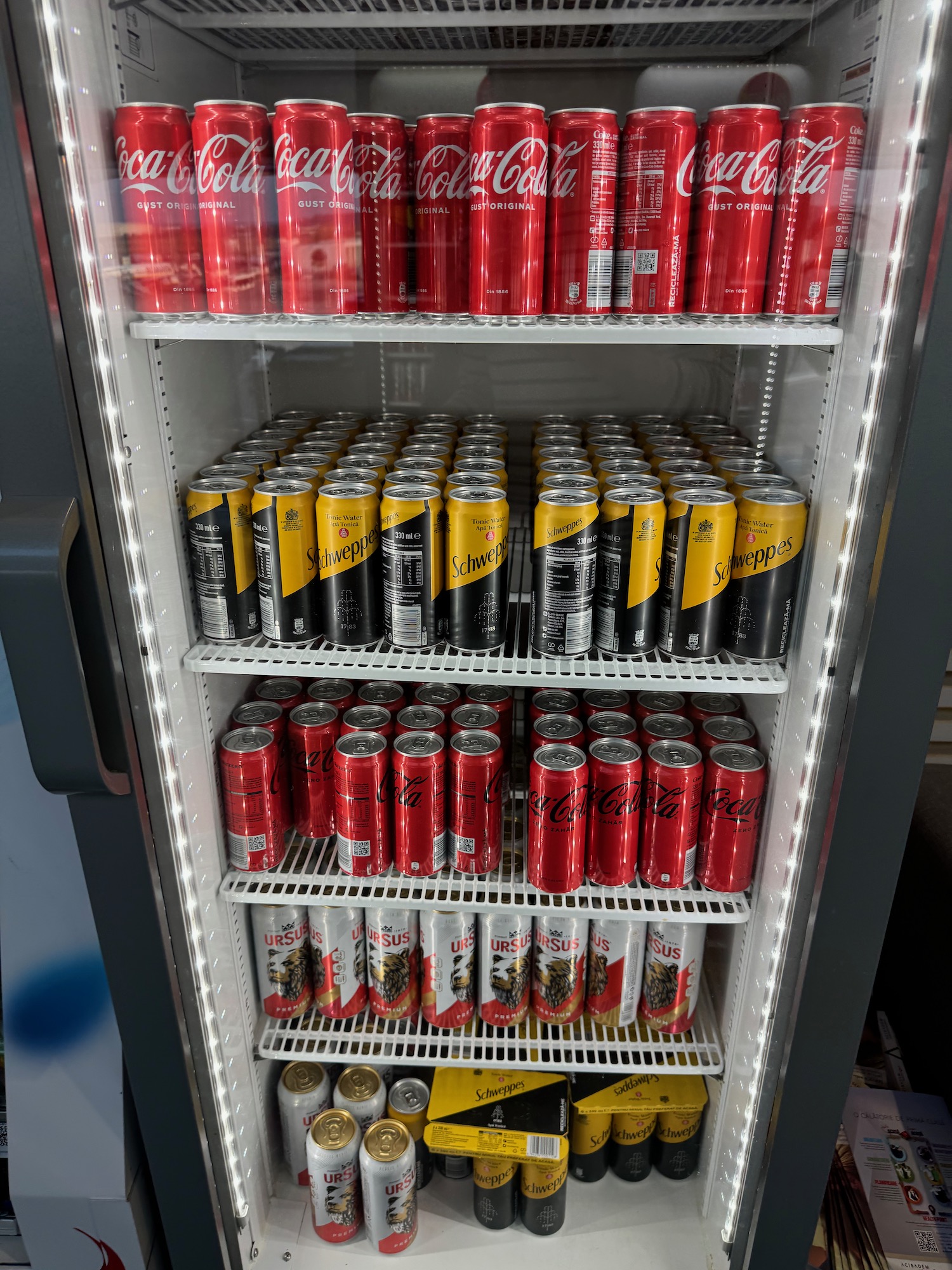 a refrigerator full of cans