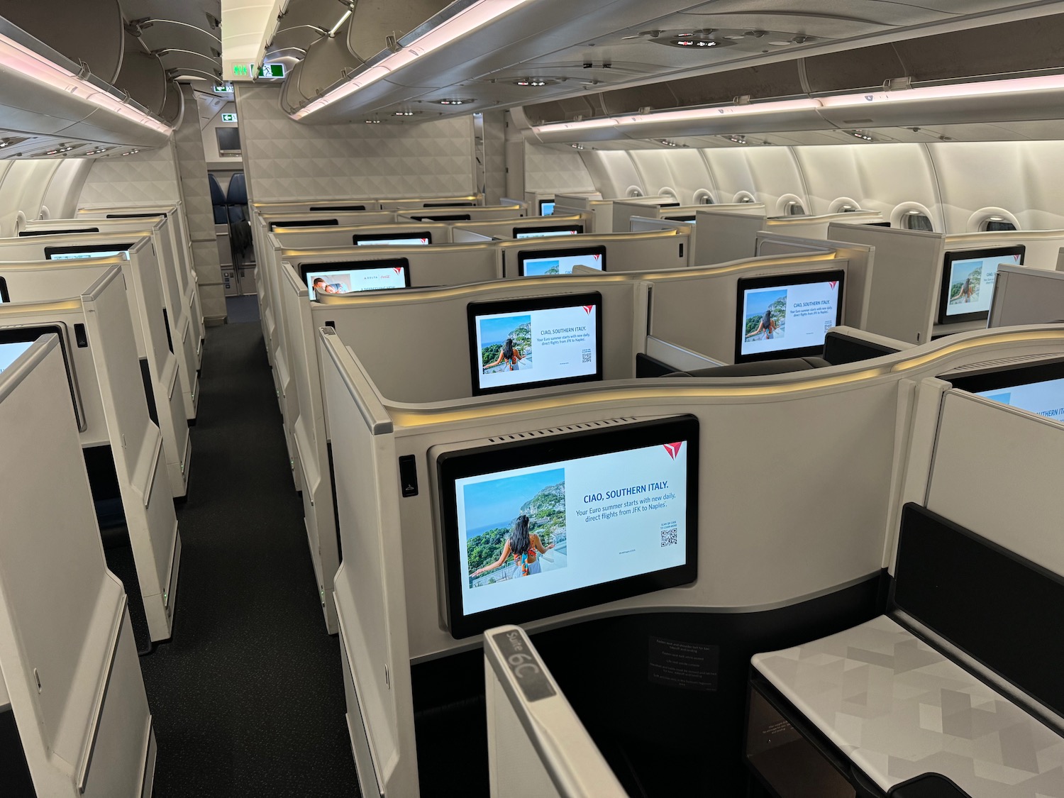 a row of screens in an airplane