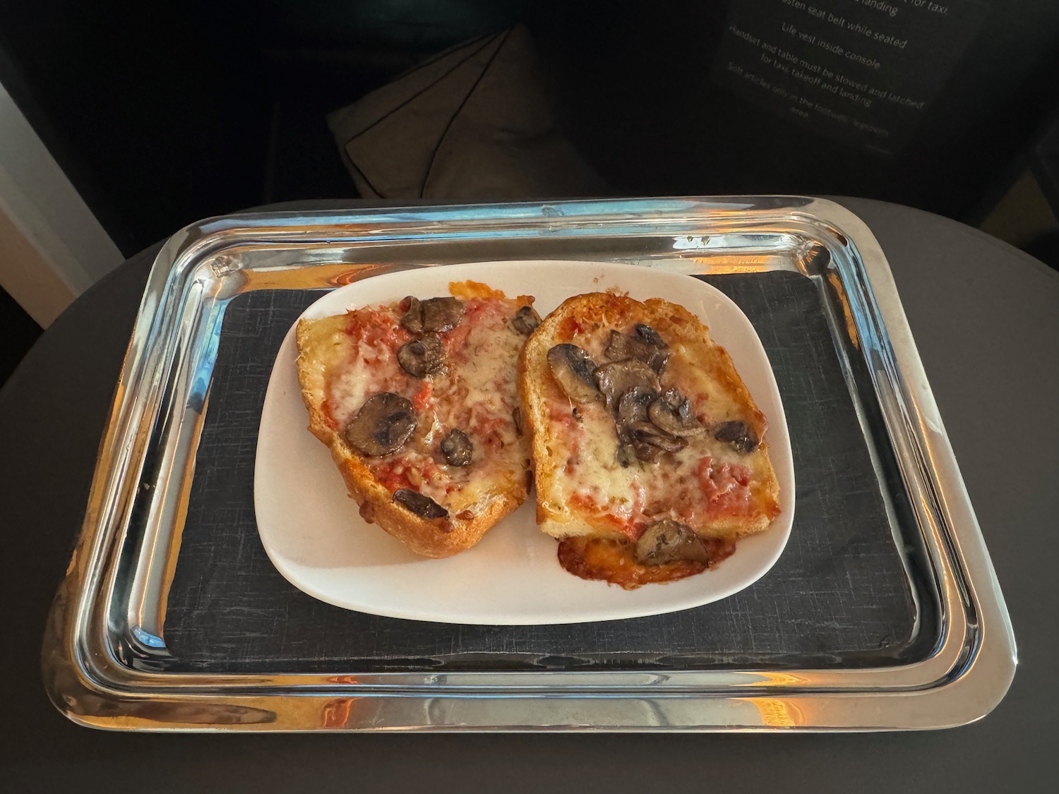 a plate of food on a tray