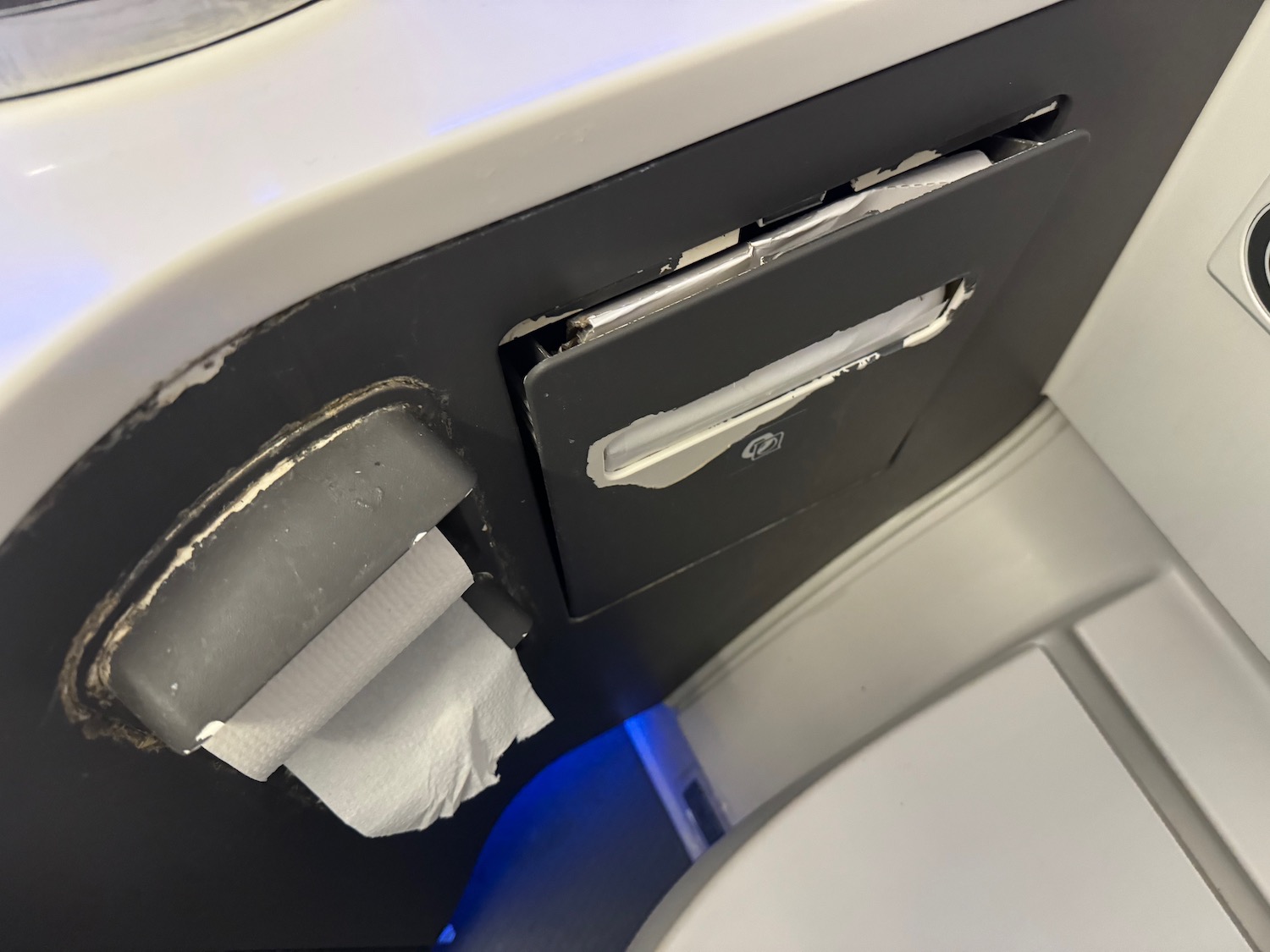a toilet paper dispenser in a plane