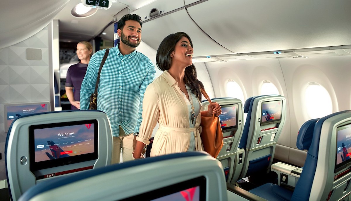 a man and woman on an airplane