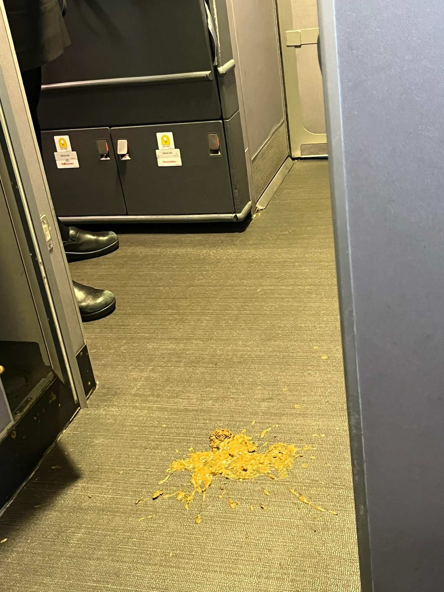 a yellow crumbs on the floor