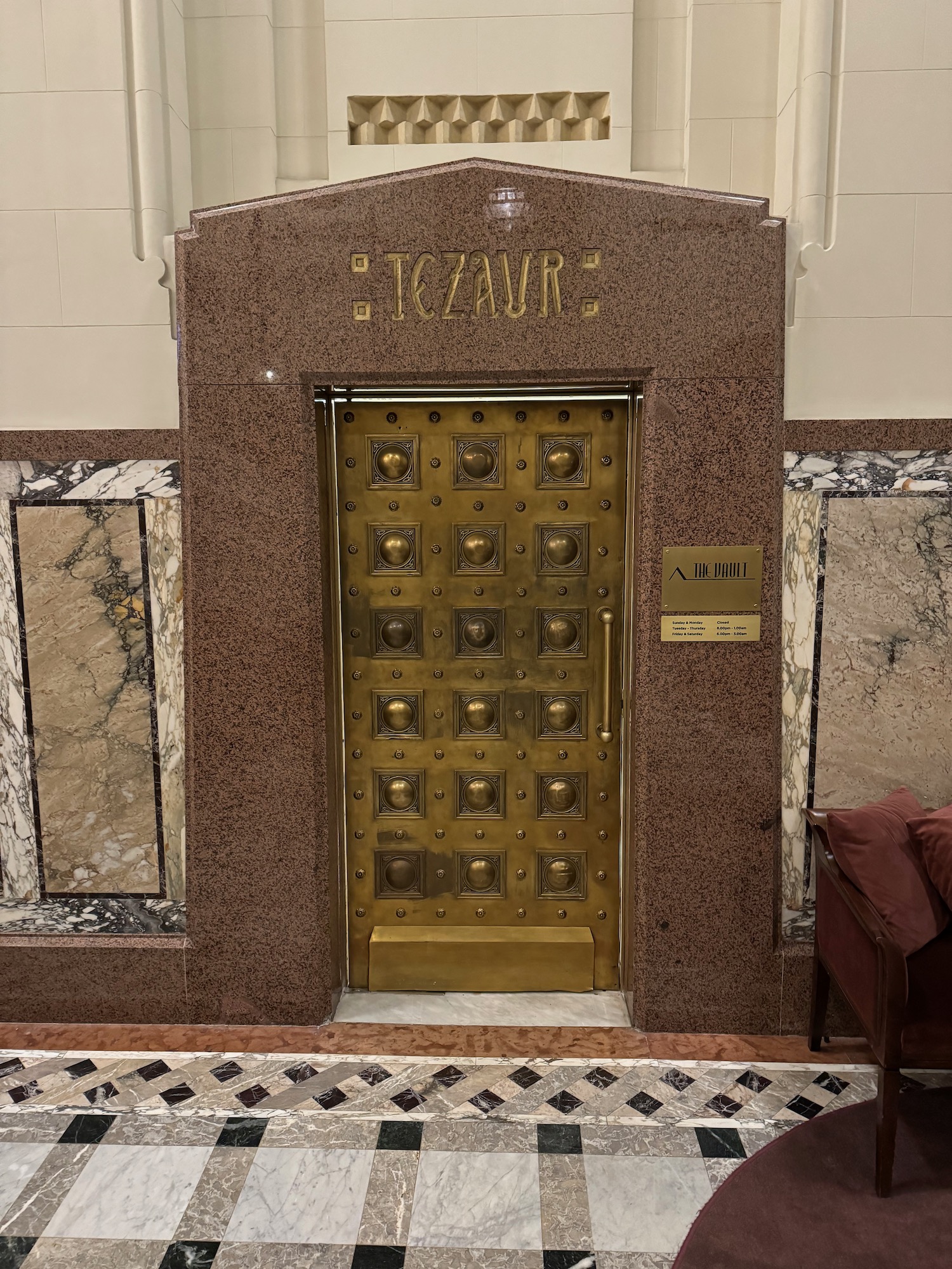 a gold door in a building