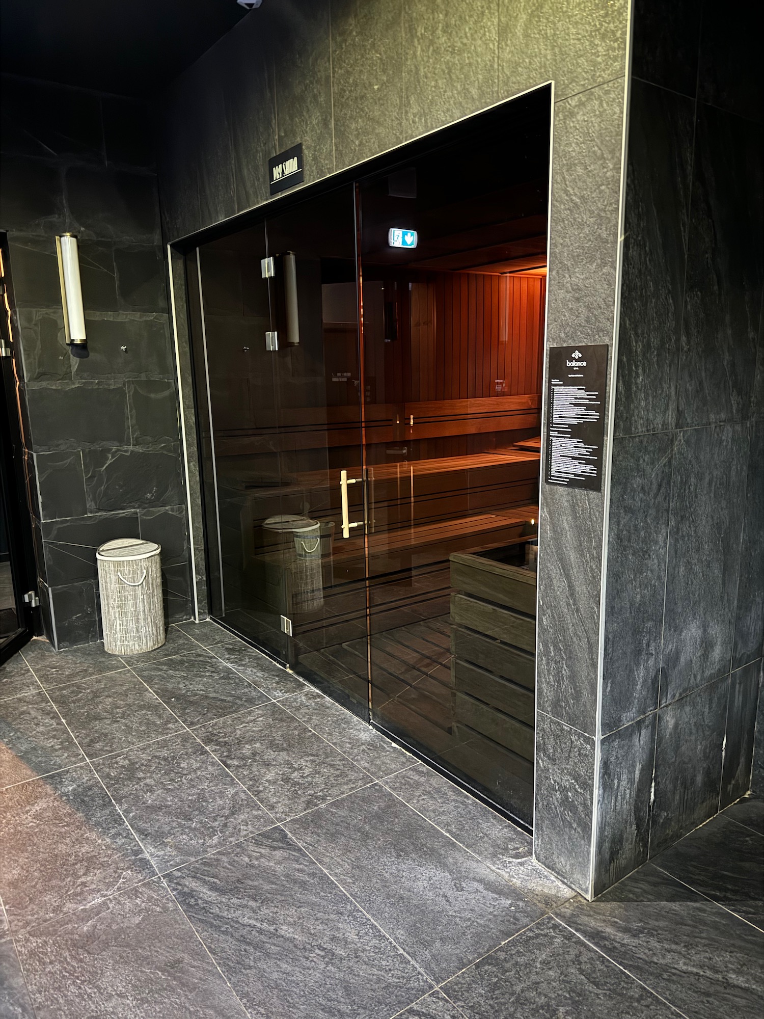 a glass door of a sauna