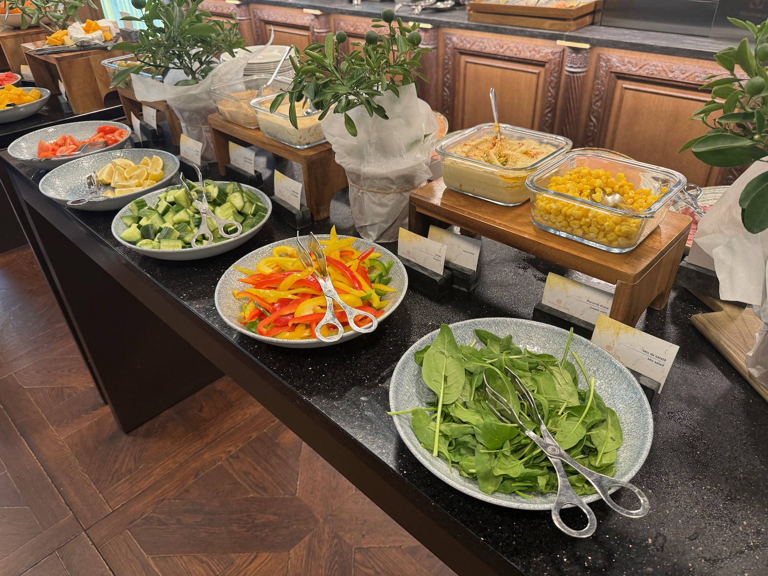 a buffet table with different food items on it