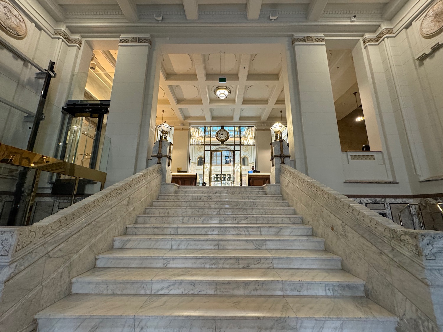 a marble staircase in a building