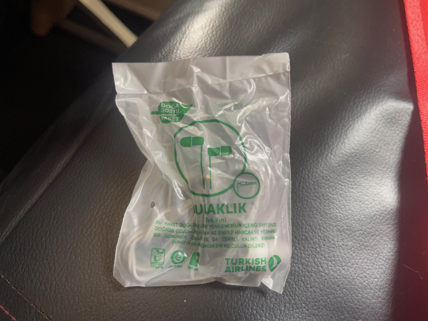 a plastic bag with green text on it