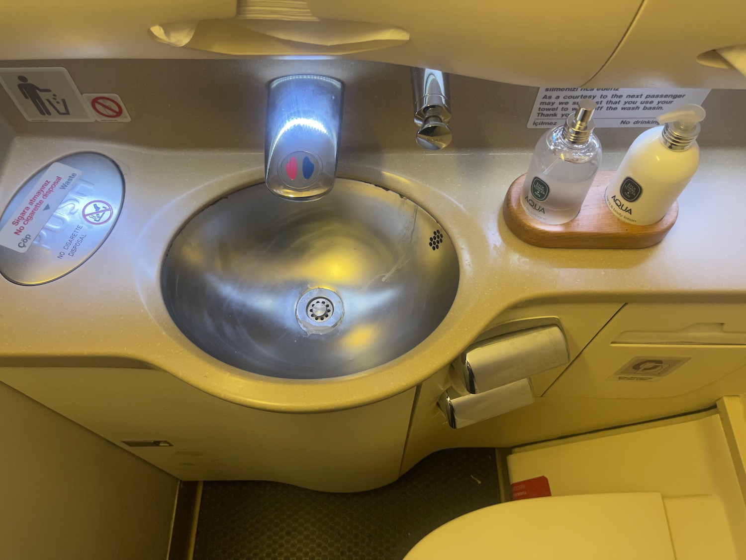 a sink and soaps on a plane