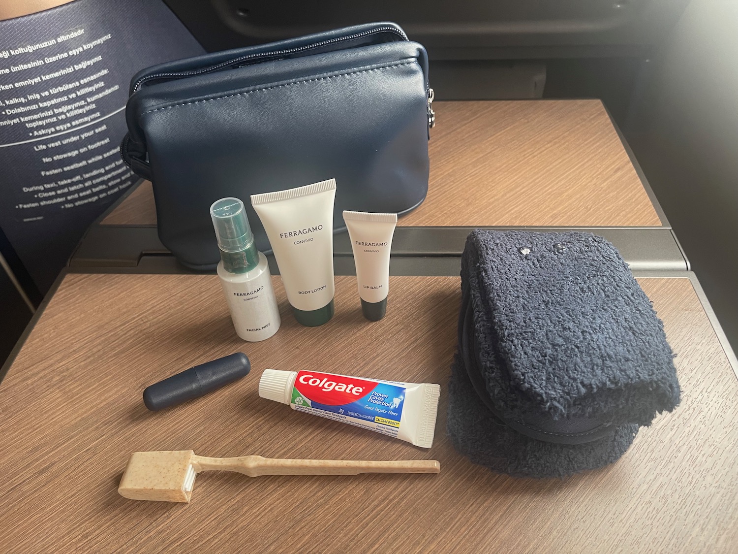 a group of toiletries and a toothbrush on a table