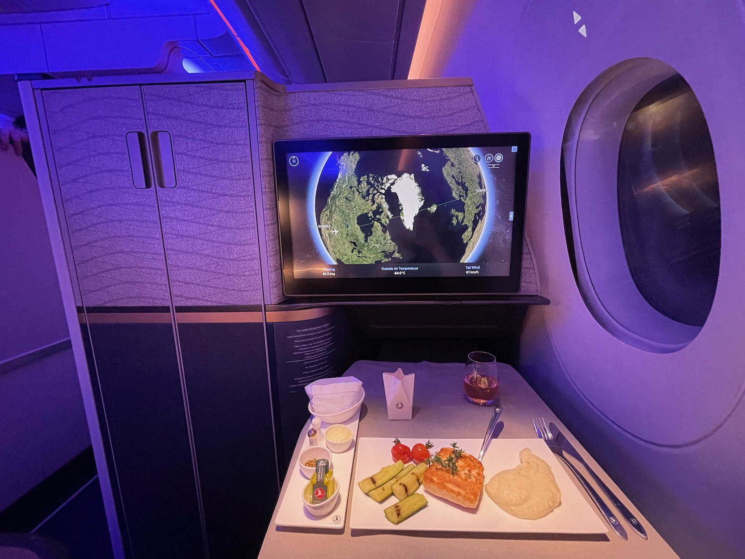 a tv on a table in a plane
