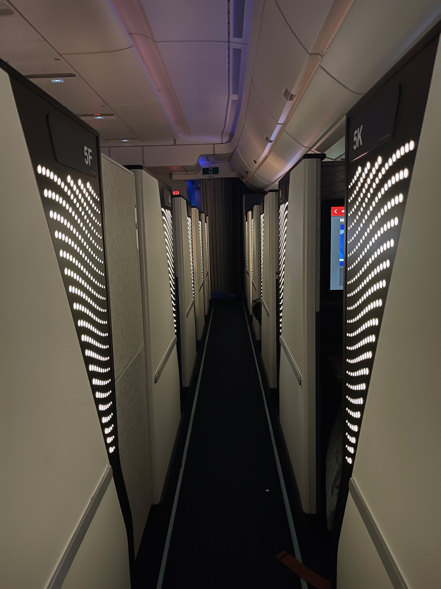 a long hallway with rows of doors