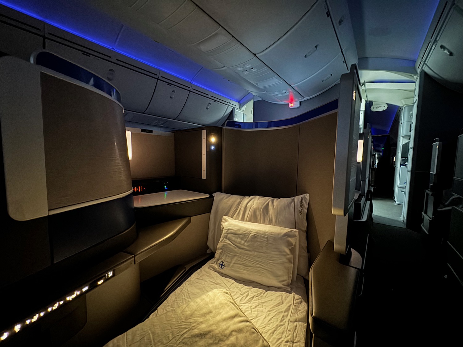 a bed in a cabin of an airplane