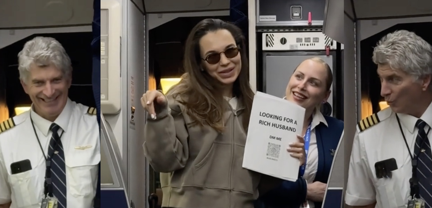 a woman pointing at a paper with a woman pointing