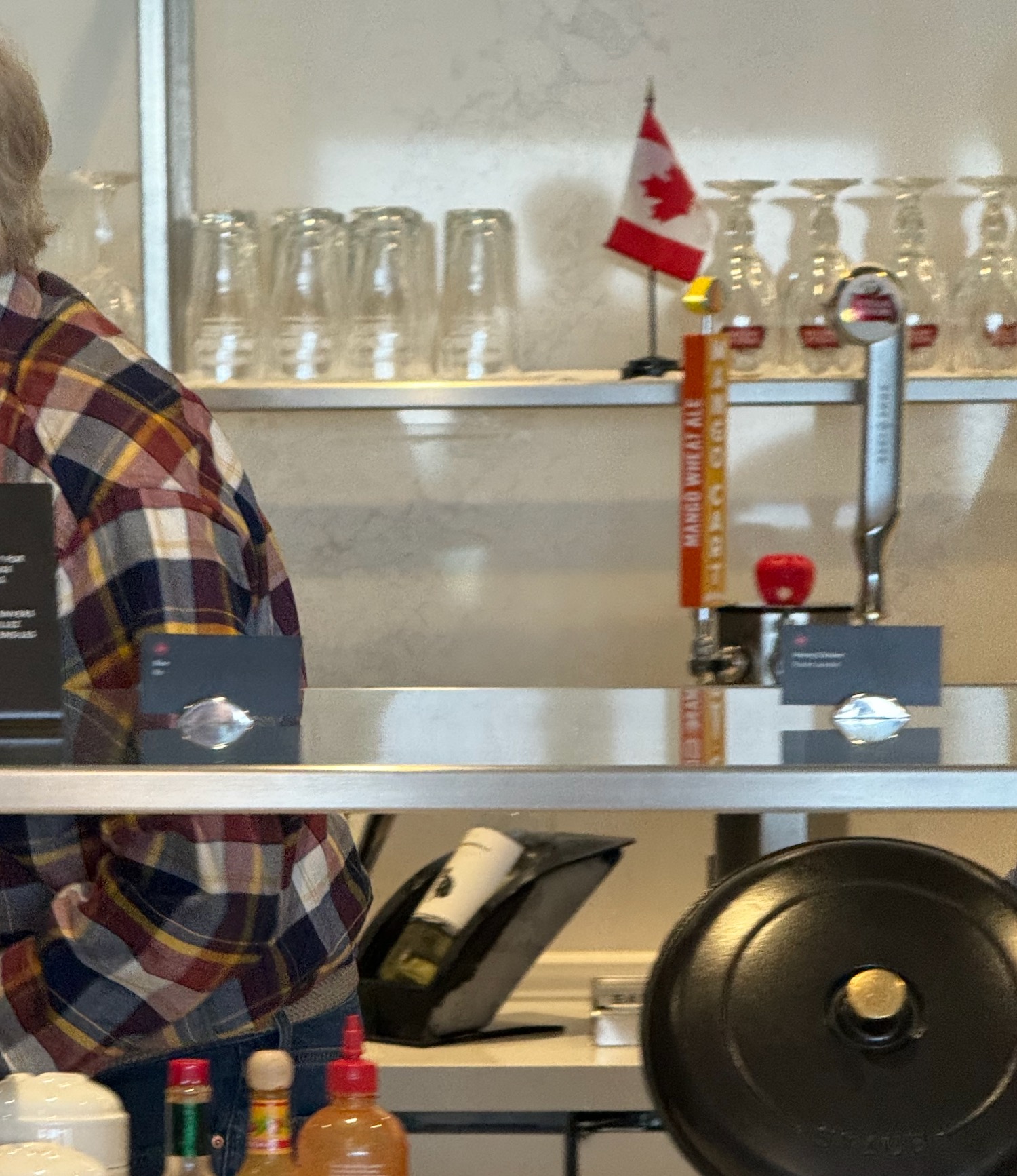 a man standing behind a counter