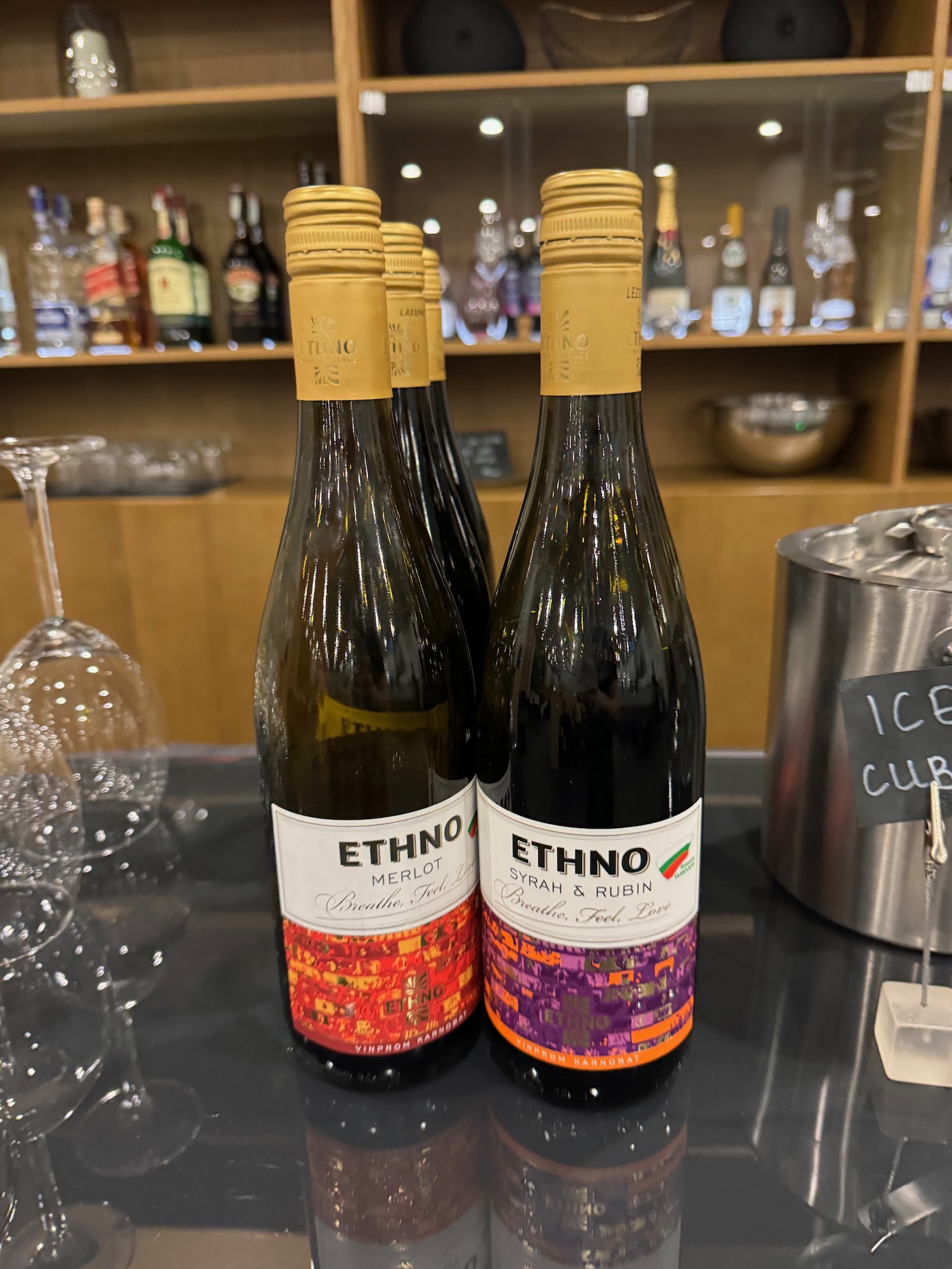 a group of wine bottles on a table