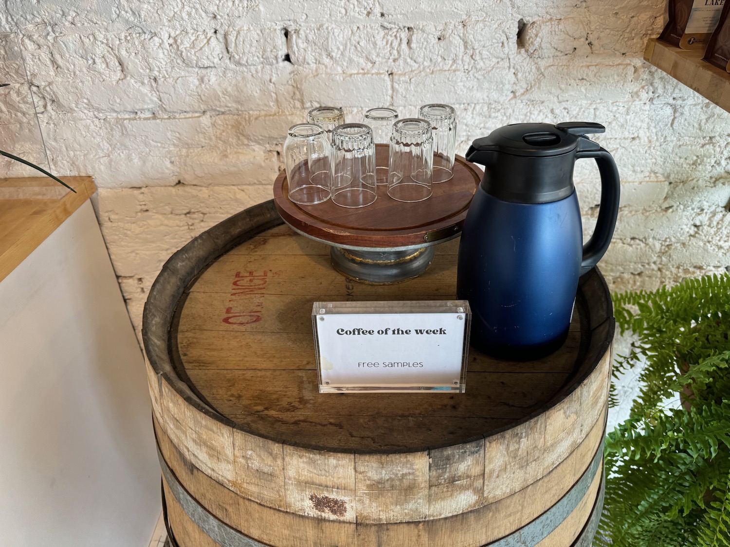 a barrel with glasses on it