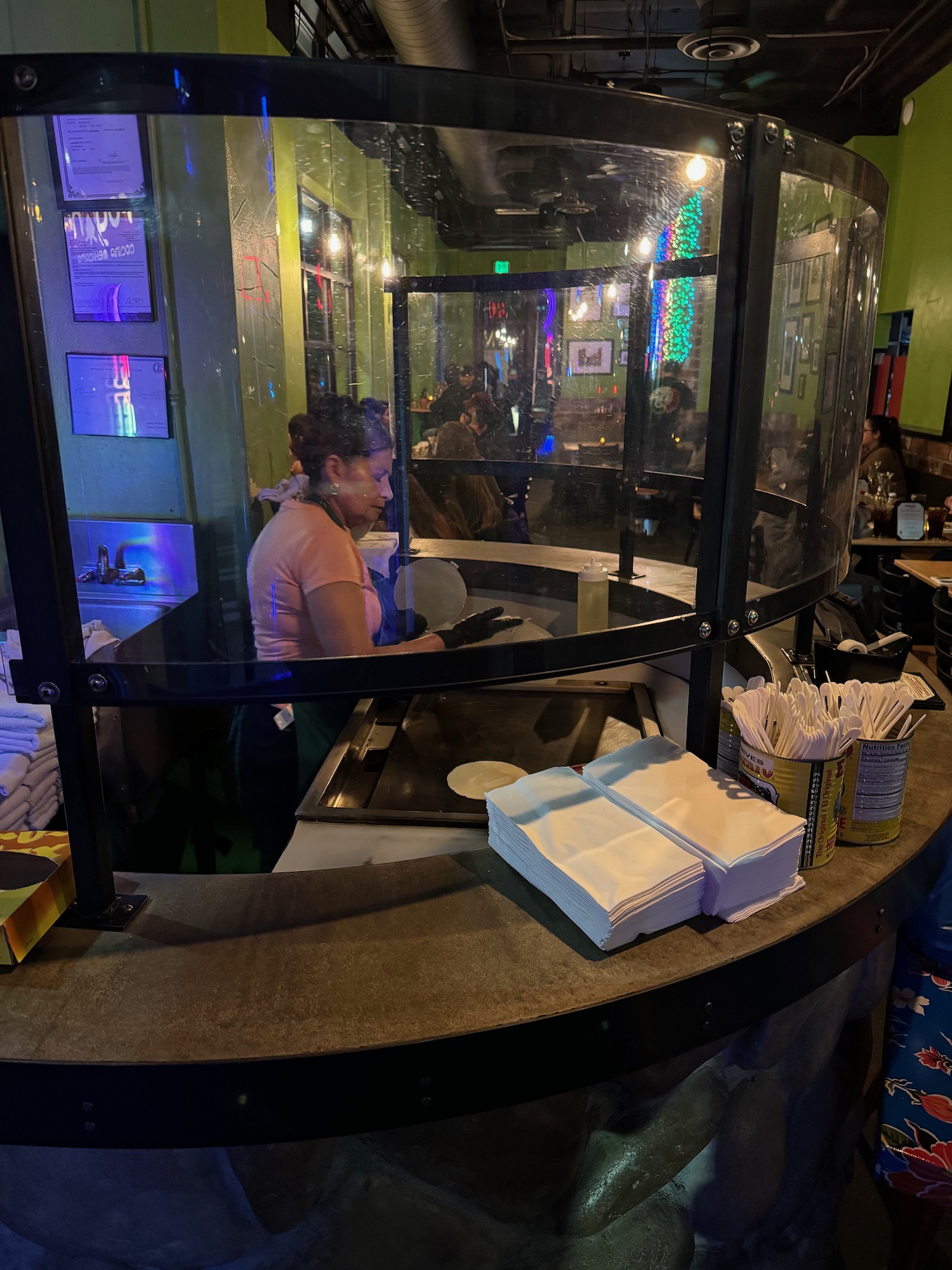 a woman working at a counter