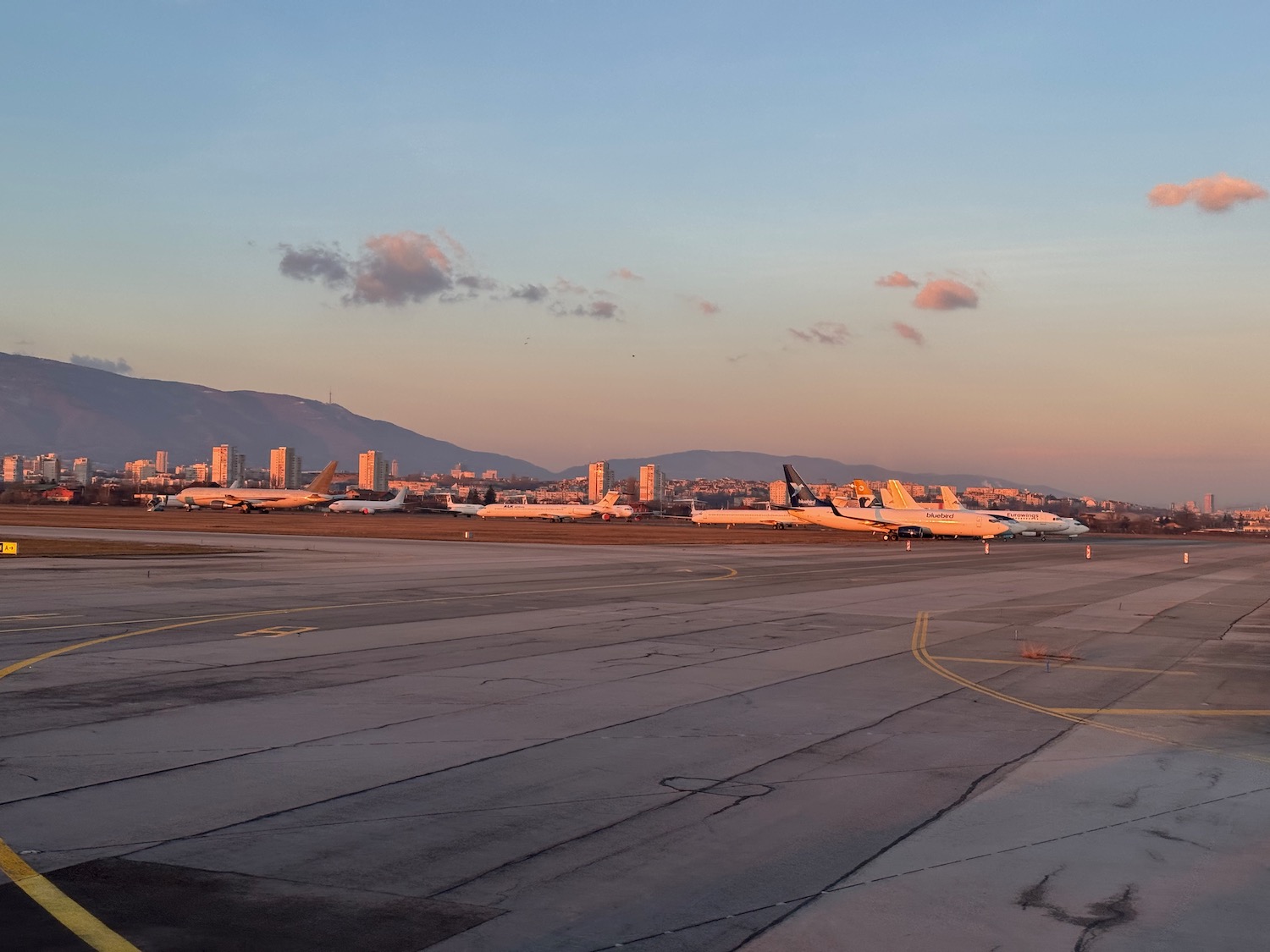 a runway with airplanes on it