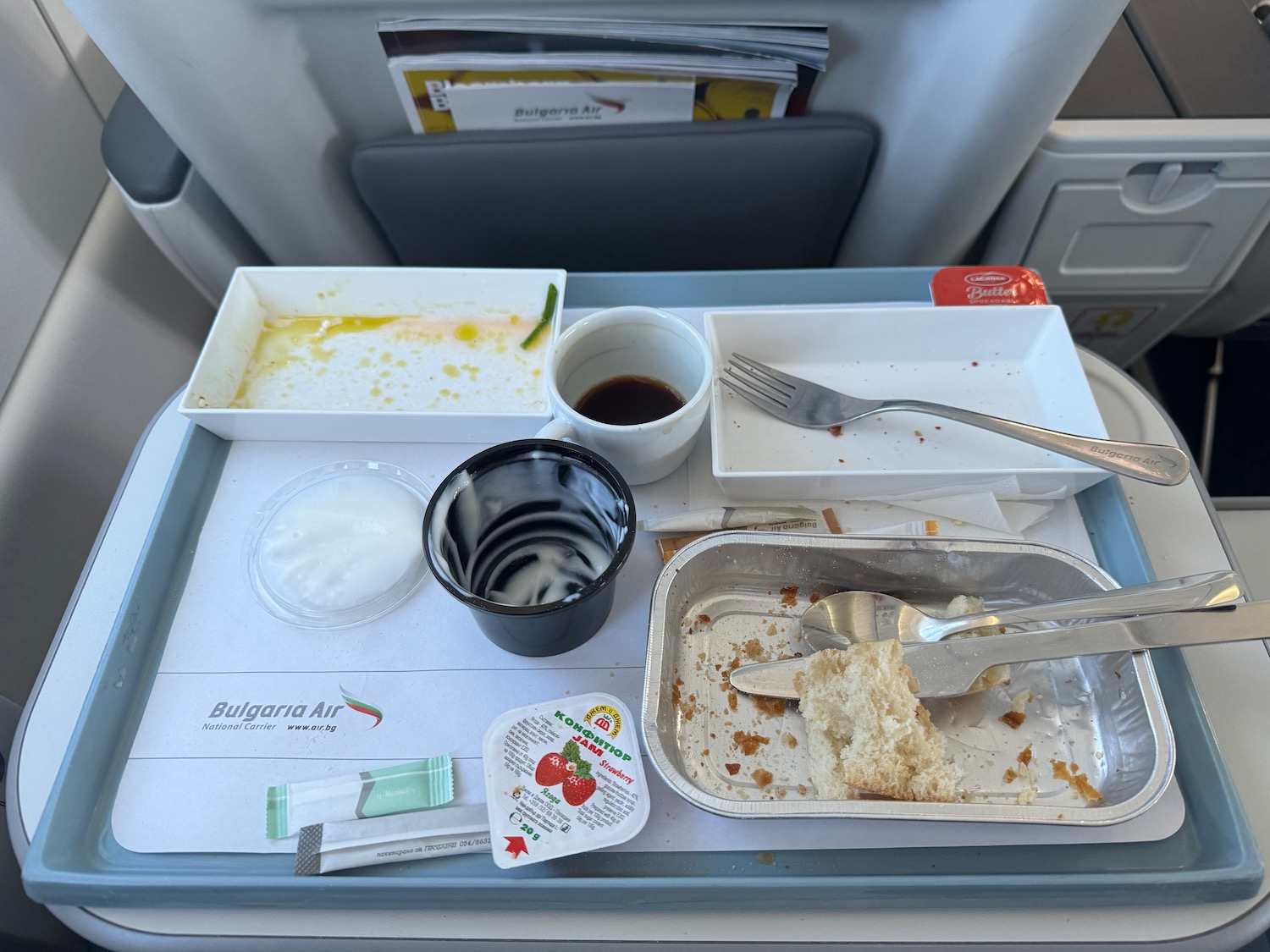 a tray of food on a plane