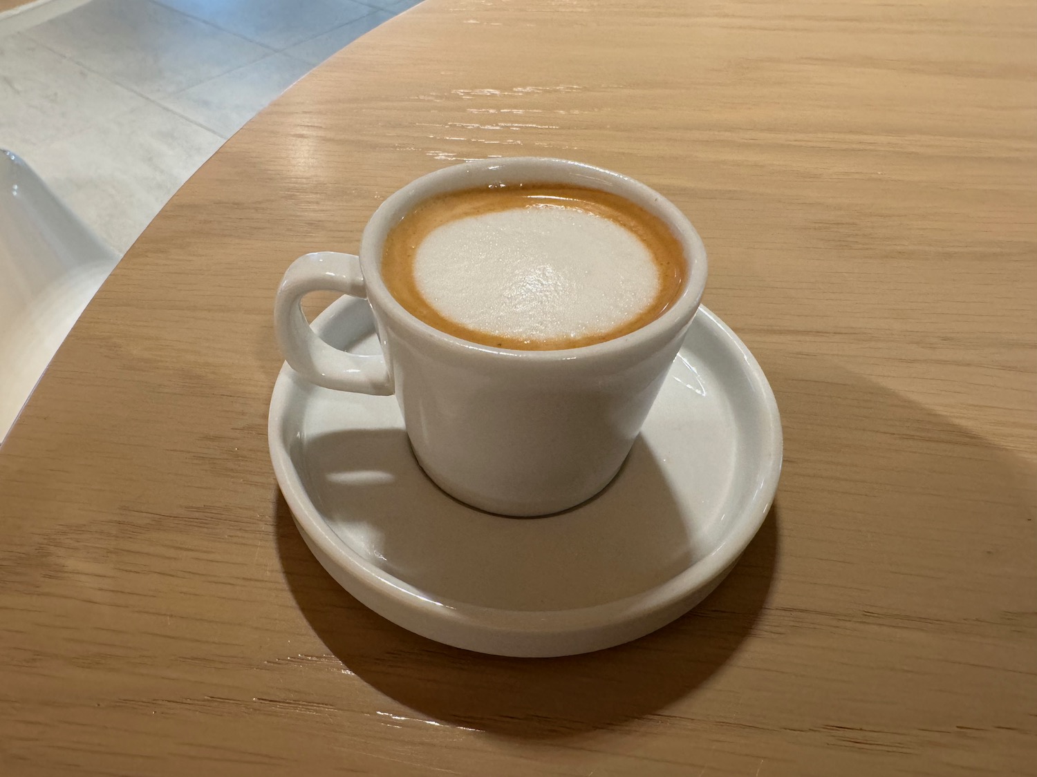 a cup of coffee on a saucer