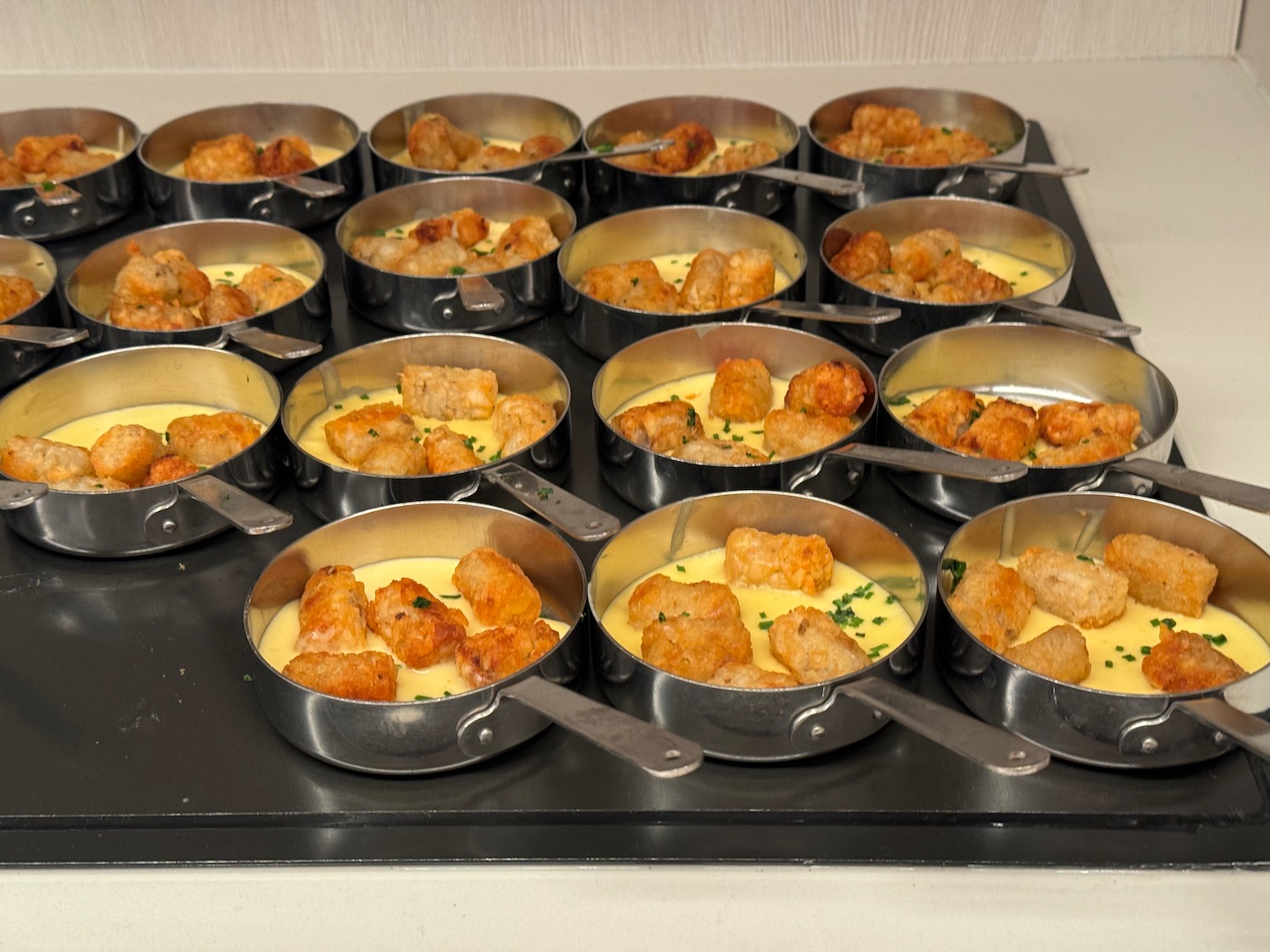a group of pots of food