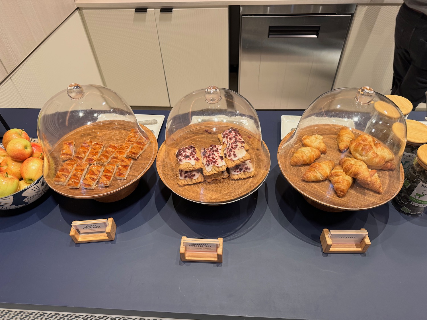 a group of bowls of pastries on a table