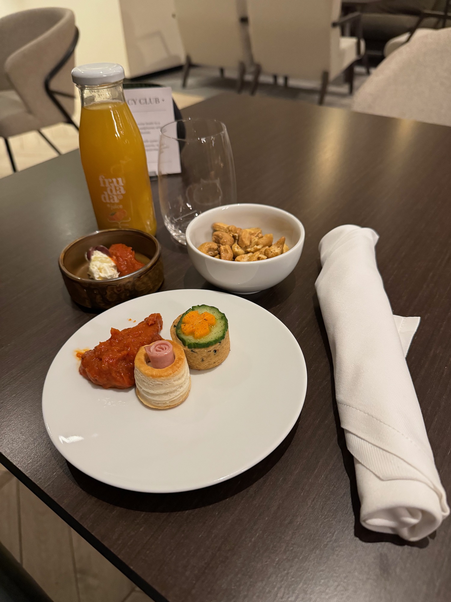 a plate of food and a drink on a table