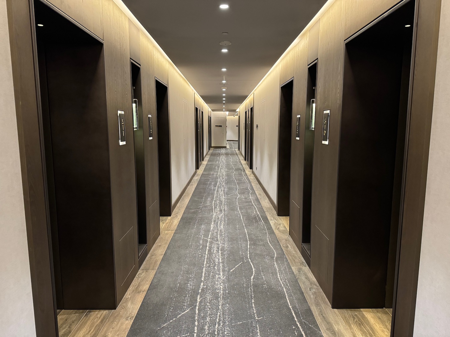 a hallway with many doors