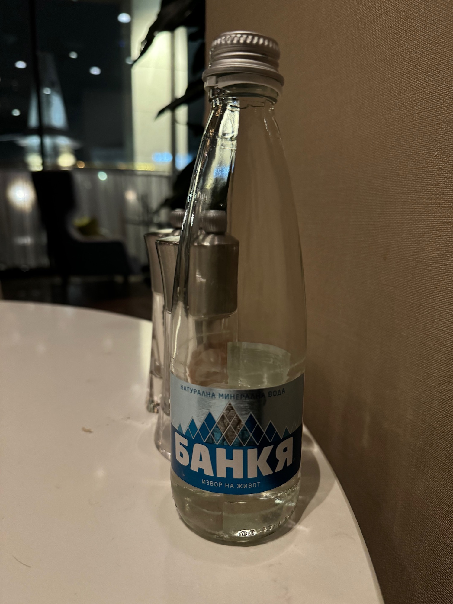 a bottle of liquid on a table