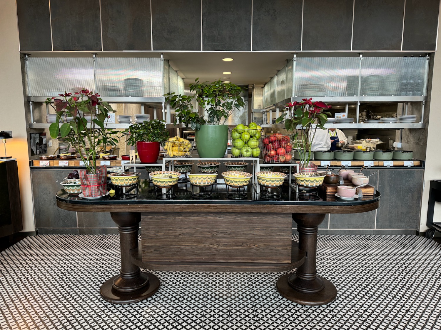 a table with fruit and flowers on it