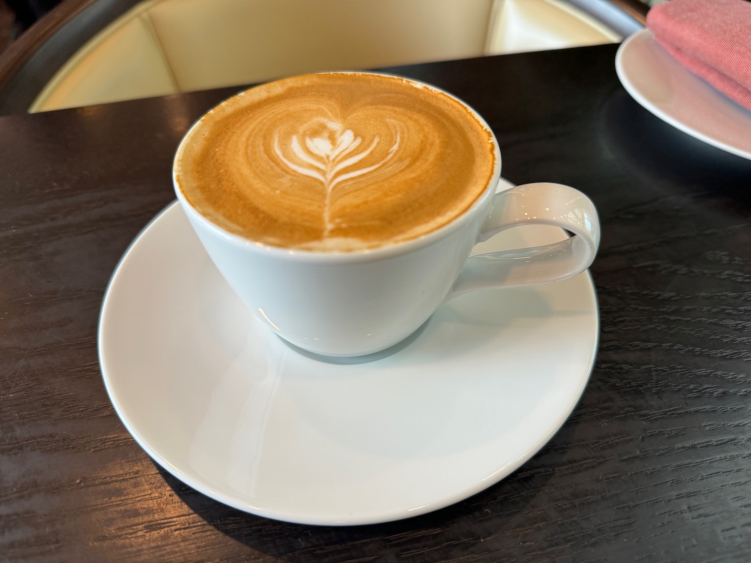 a cup of coffee on a saucer