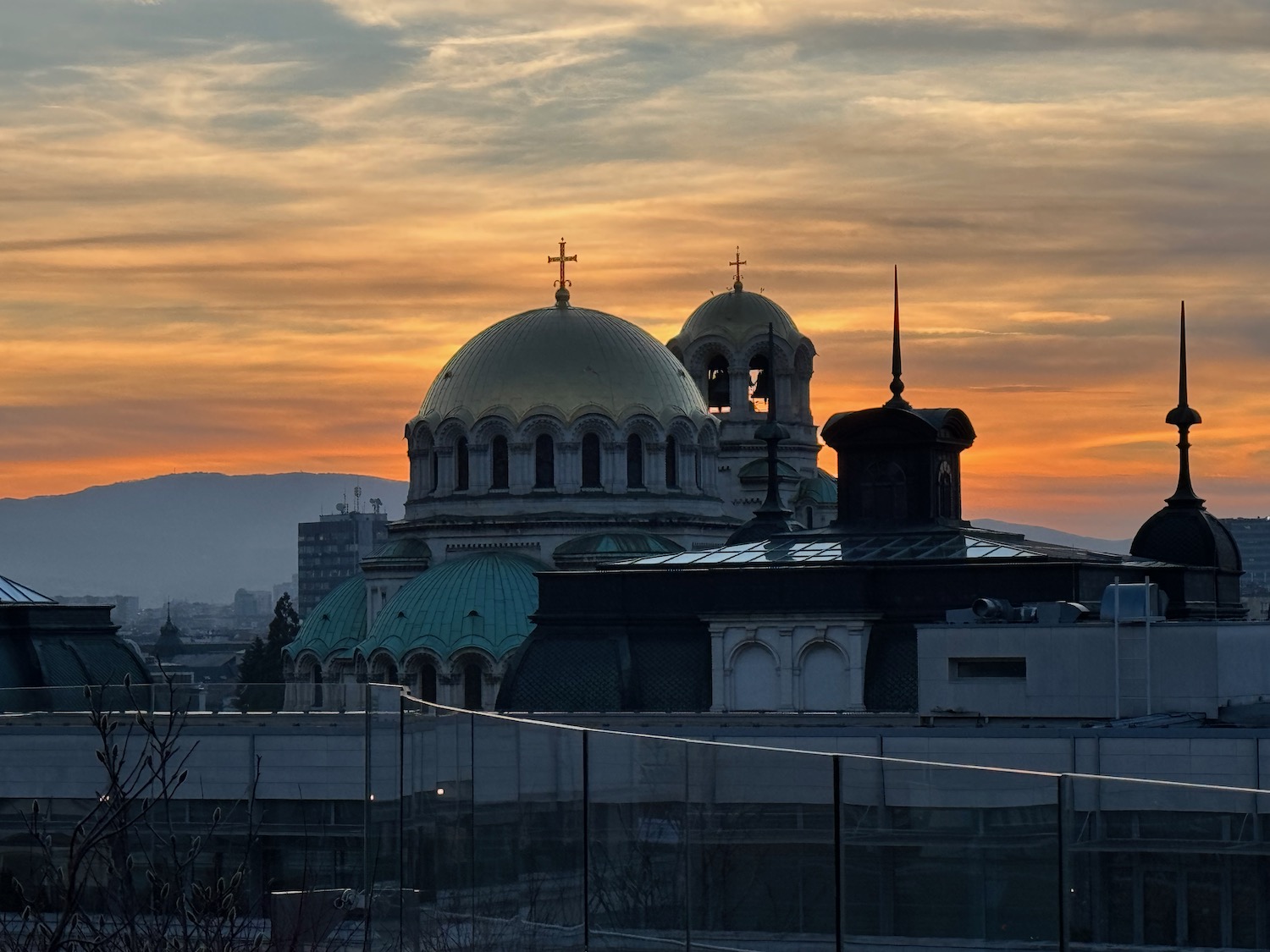 a building with a dome and a cross on top