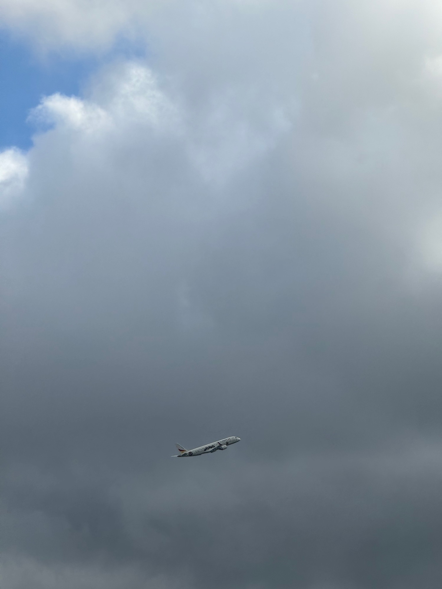 a plane flying in the sky