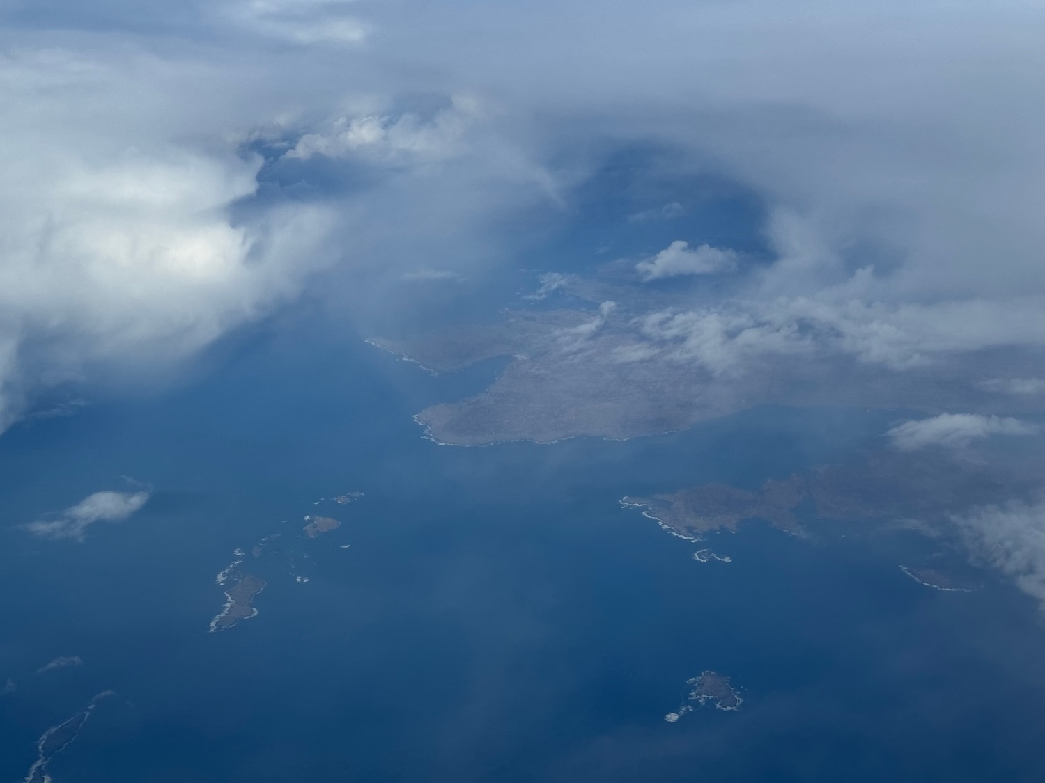 aerial view of land and clouds