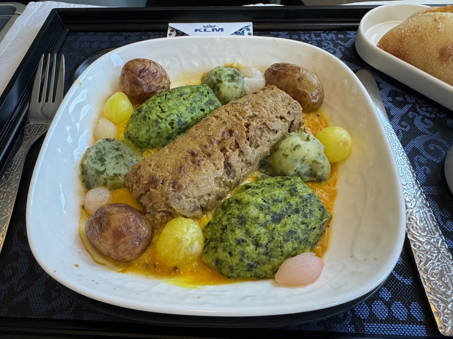 a plate of food on a tray