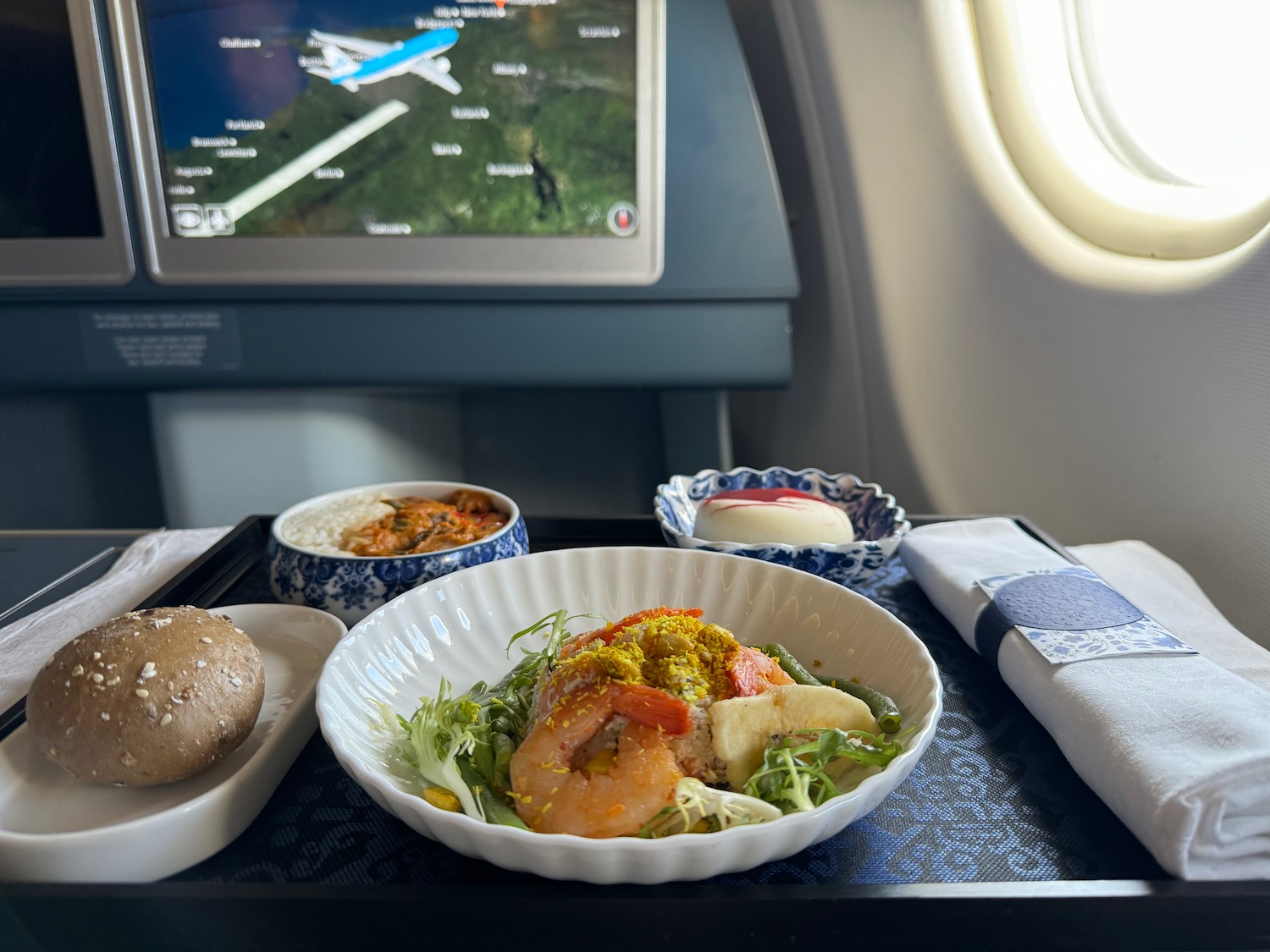 food on a tray in an airplane