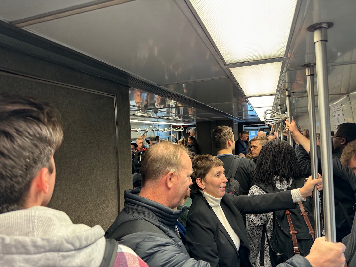 a group of people on a subway