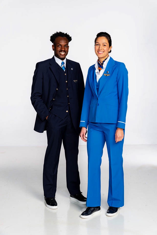a man and woman wearing blue uniforms