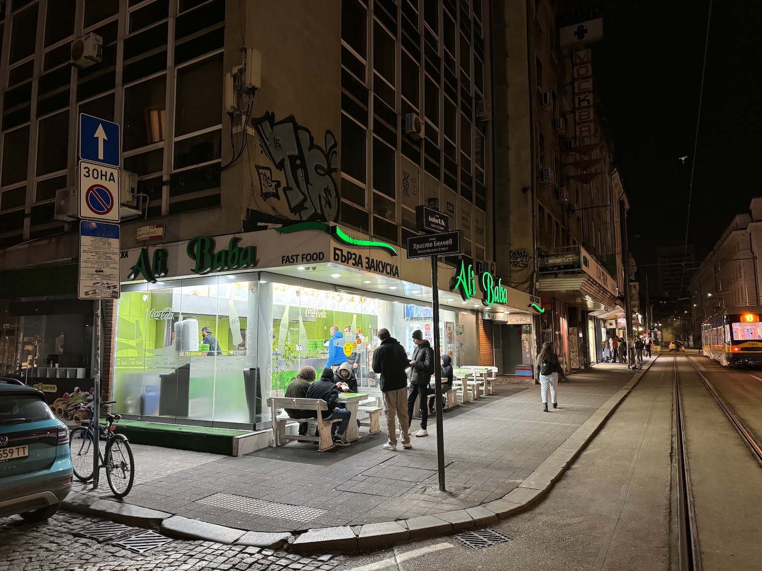 people outside of a restaurant