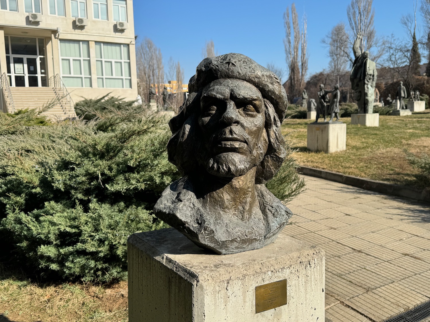 a statue of a man in a park