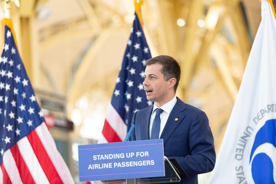 a man speaking at a podium