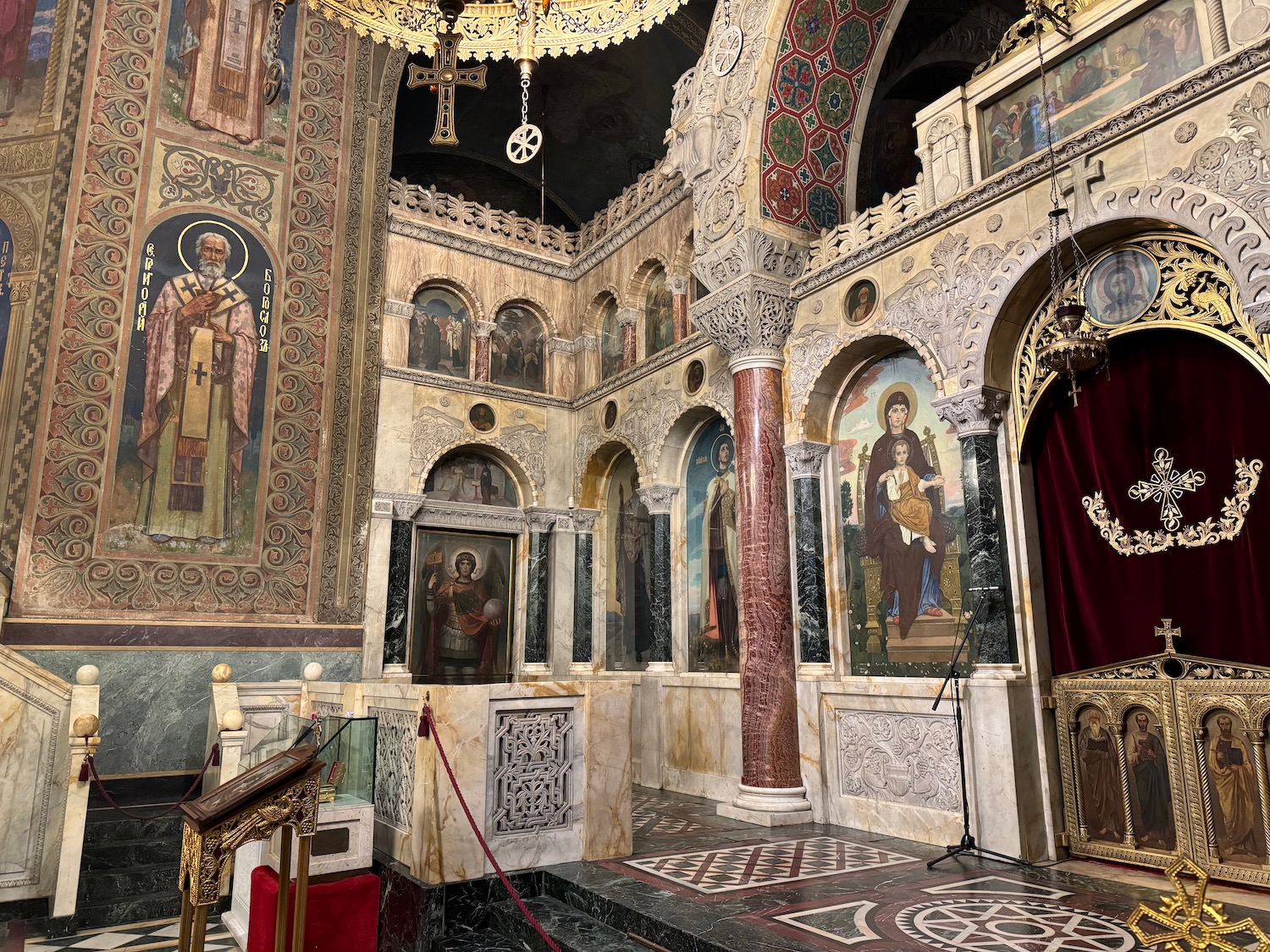 a ornate building with paintings on the walls