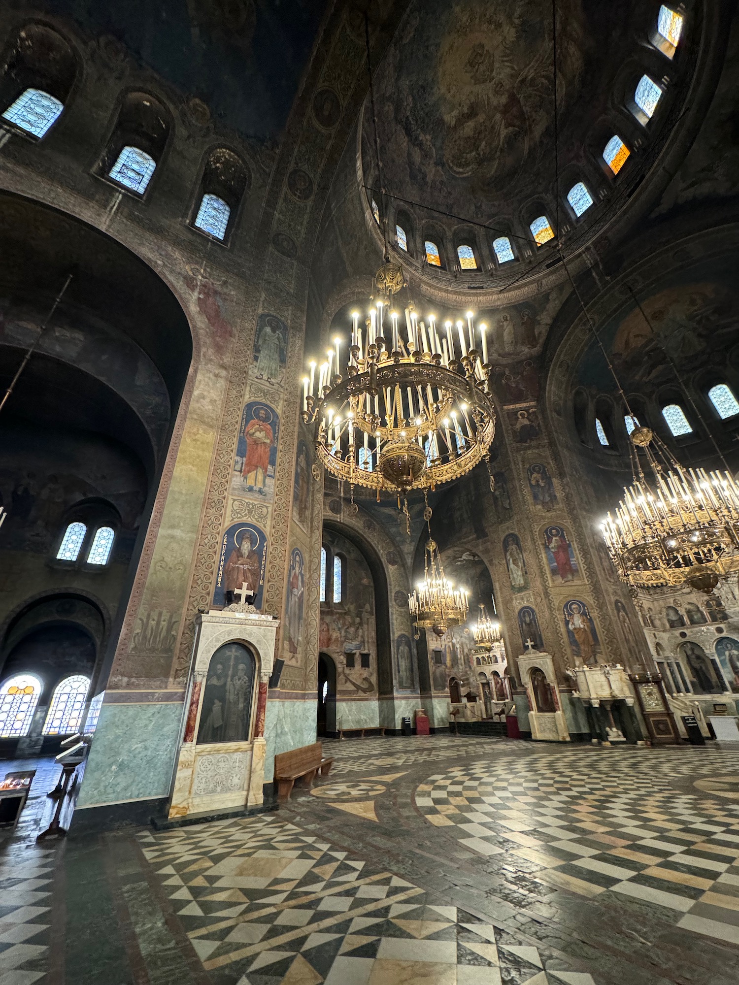 a large ornate building with many windows and chandeliers