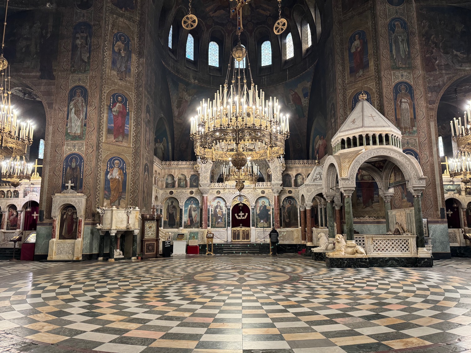 a large ornate building with a chandelier