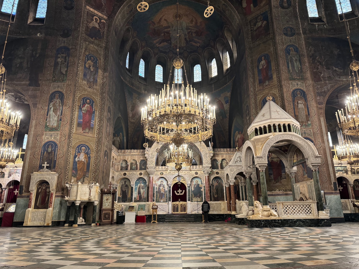 a large ornate building with a chandelier