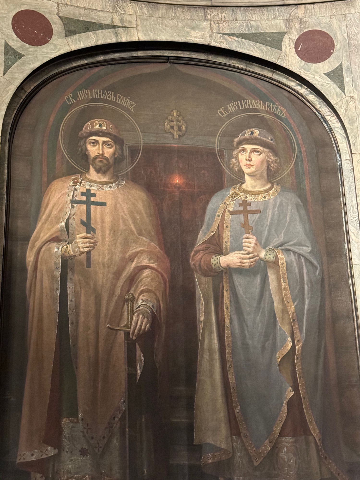 a painting of a man and a woman holding crosses