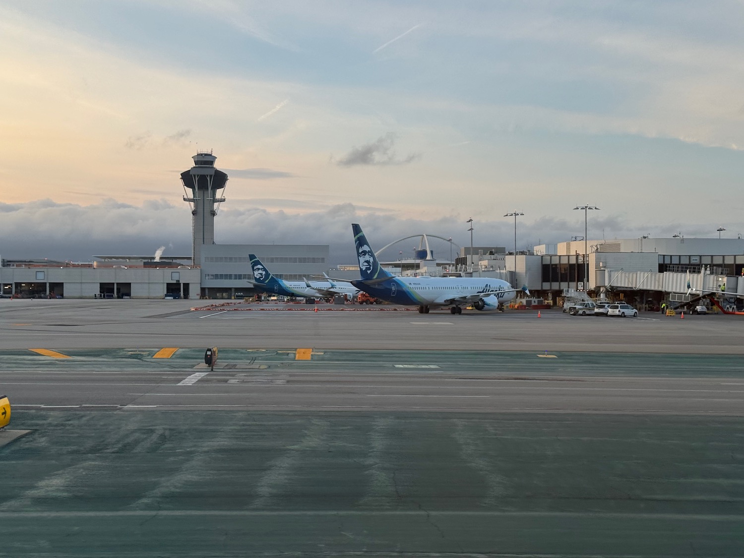 airplanes parked at an airport