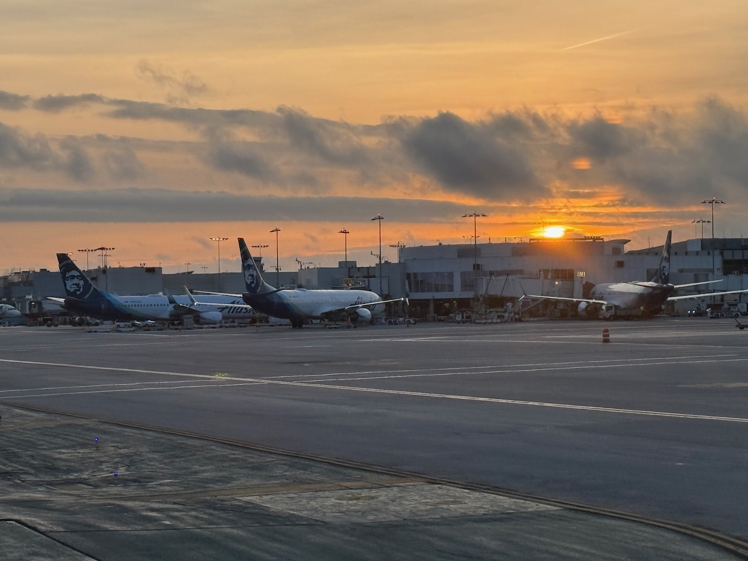 airplanes parked on a runway